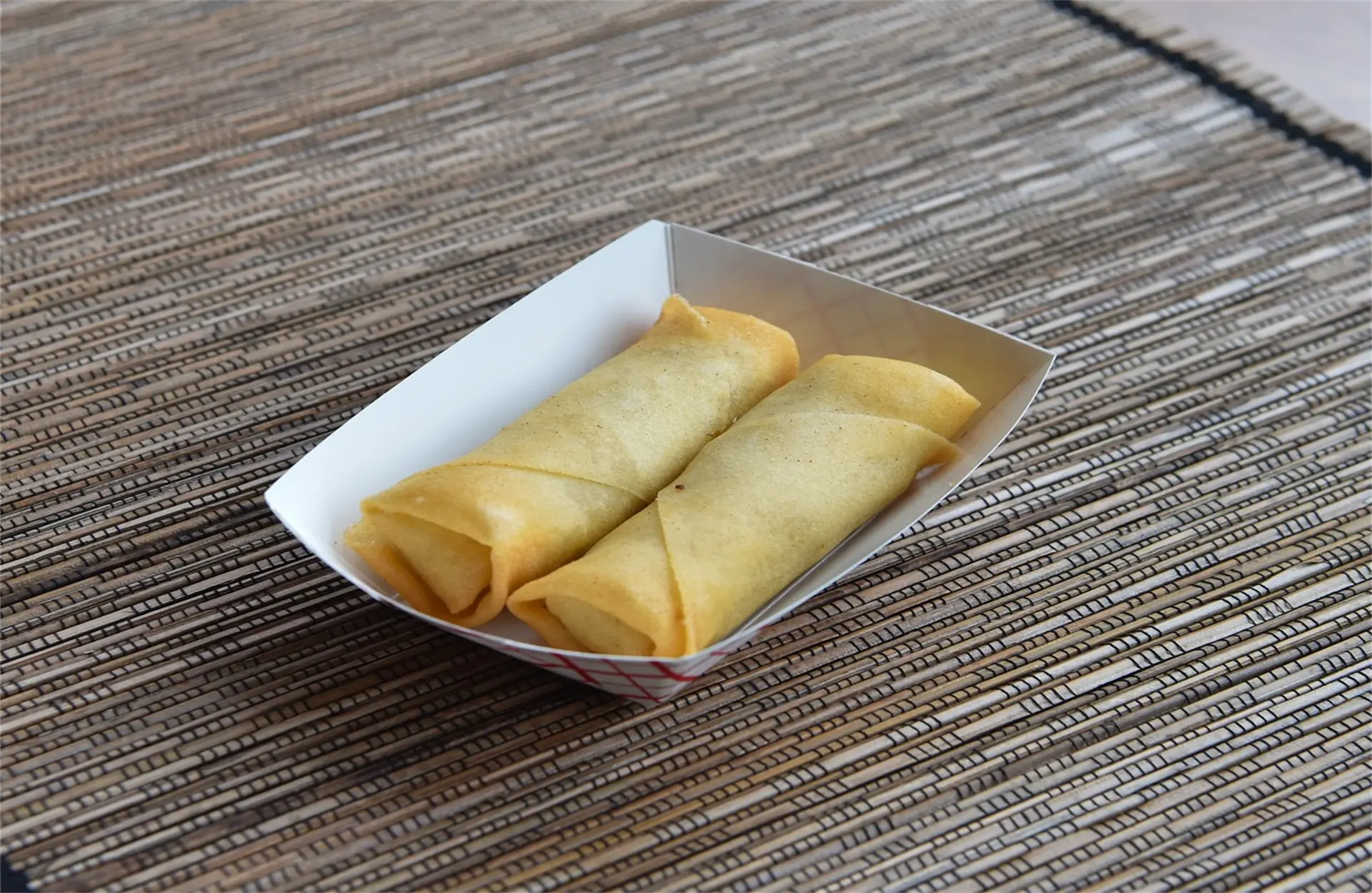 Golden-Pot-Asian-Restaurant-Egg-Rolls-Jacksonville Crispy fried egg rolls with savory filling.