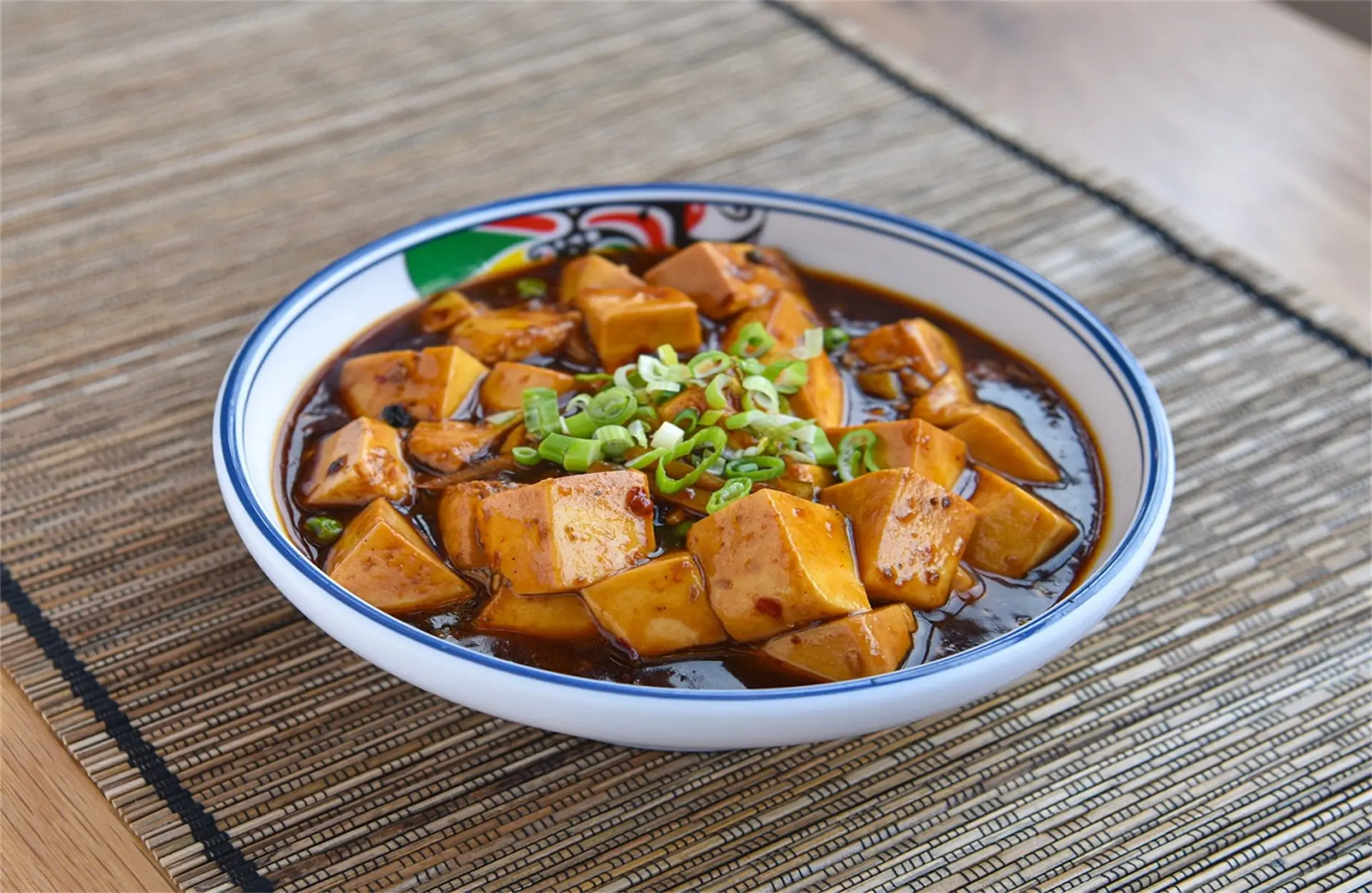 Golden-Pot-Asian-Restaurant-Mapo-Tofu-Jacksonville Spicy Mapo tofu with scallions in savory sauce.